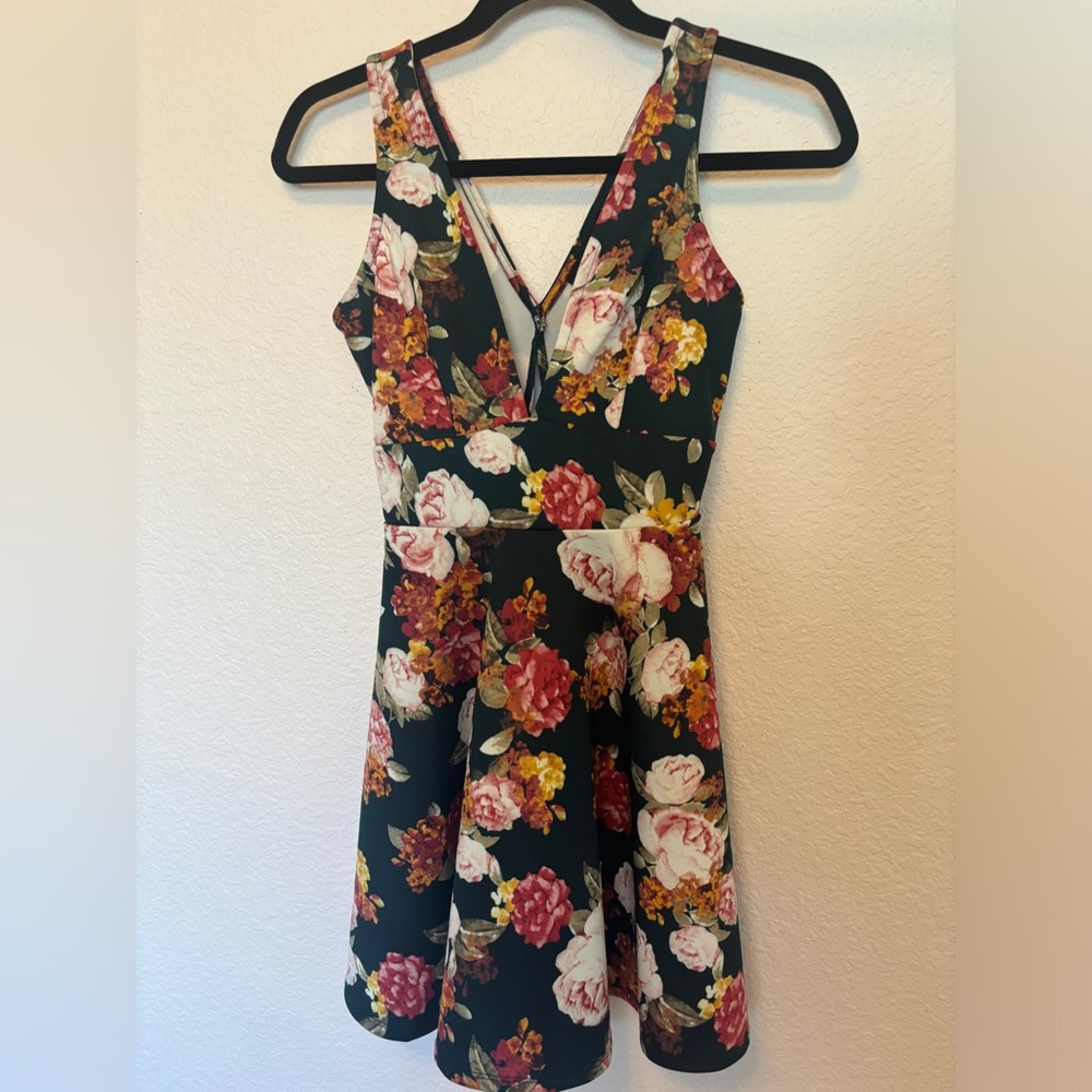 Forever 21 size small, plunge neck skater dress in dark green floral